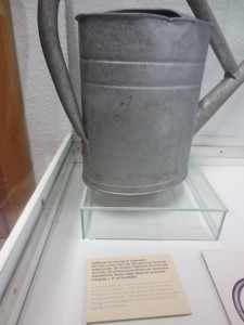 stasi watering can with camera under handle