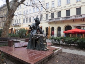 Franz Liszt plays an imaginary piano in the square named after him.